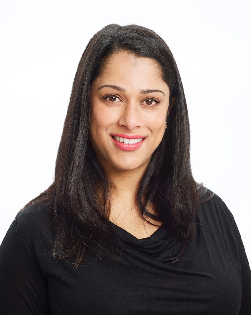 Headshot of Simone from Sublime Beauty wearing a black top